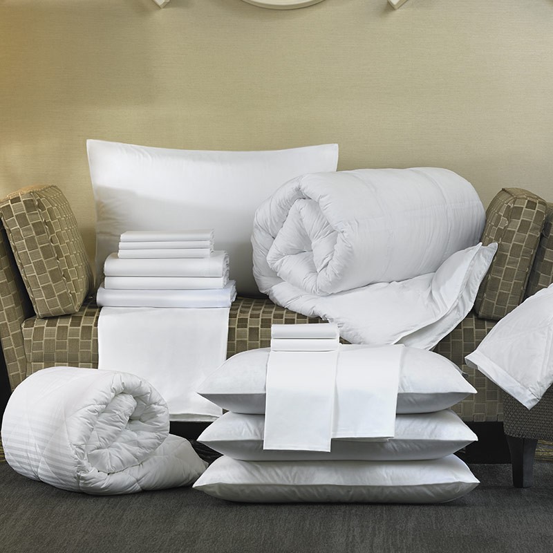 Productos textiles residencias Sábanas y ropa de cama doblada